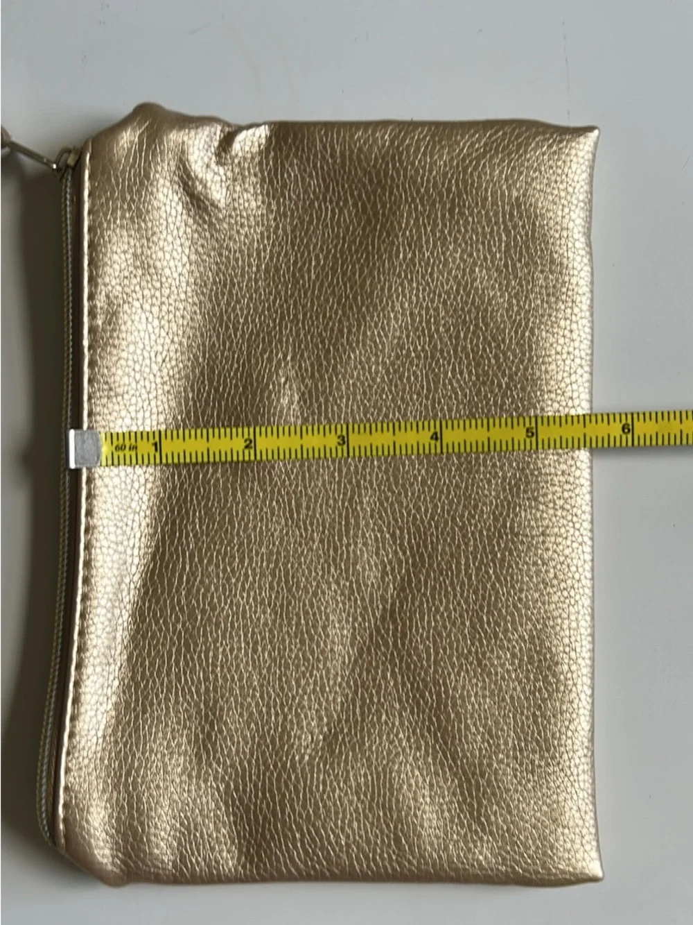 Metallic Gold Wristlet Clutch with Tassel Accent